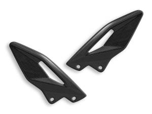 Ducabike - Ducabike0L - TRIUMPH STREET TRIPLE GLOSSY CARBON HEEL GUARDS - Image 1
